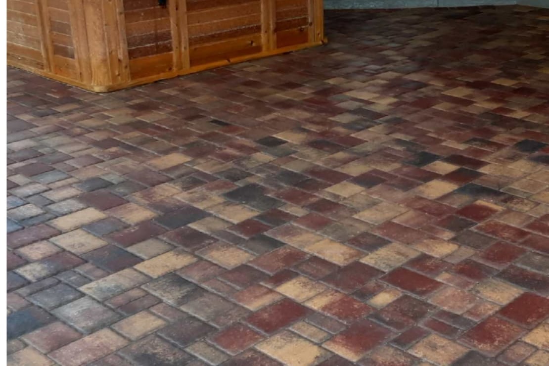 Paver spa patio sealed to a rich wet-look finish by Sandbar — real job photo